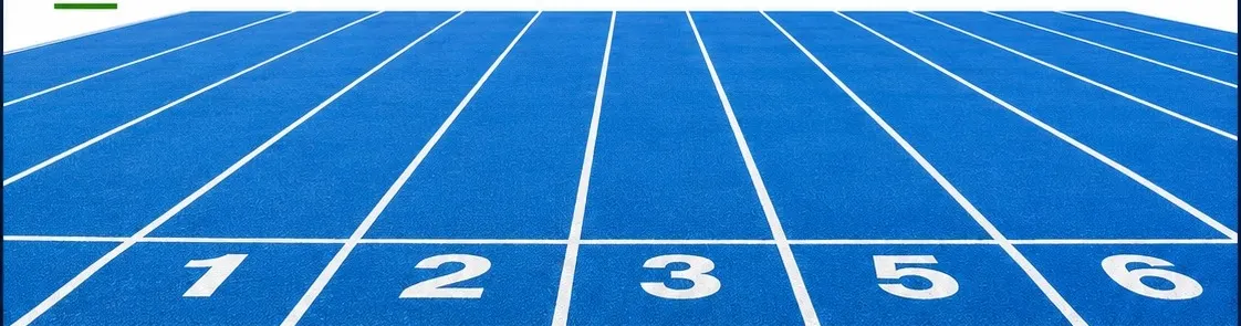Blue synthetic running track lanes with lane numbers